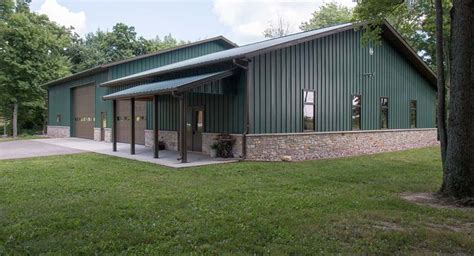 metal shop in front of house|metal exterior houses.